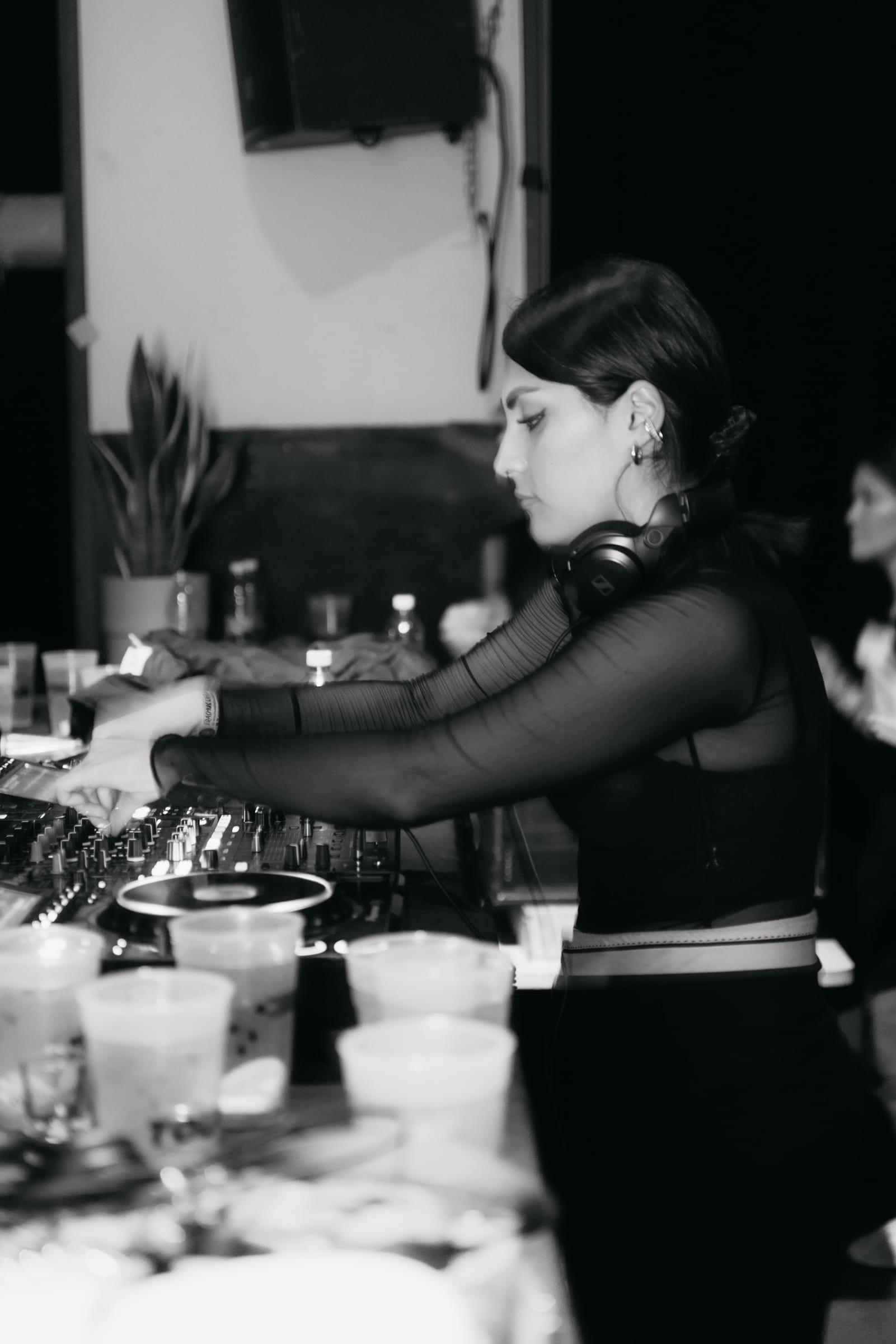 Black-and-white photo of 5OGOL working the mixer